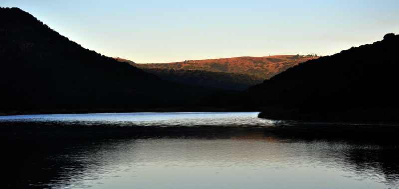 Shongweni Dam is down in a valley and it takes some time before the morning sun reaches it